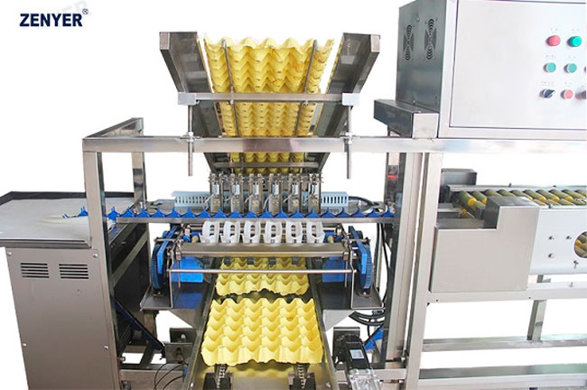 Машина для автоматической упаковки яиц в лотки по  30 штук; Автономная машина | модель: 710C Farm Packer. Производительность: 10000 яиц в час.